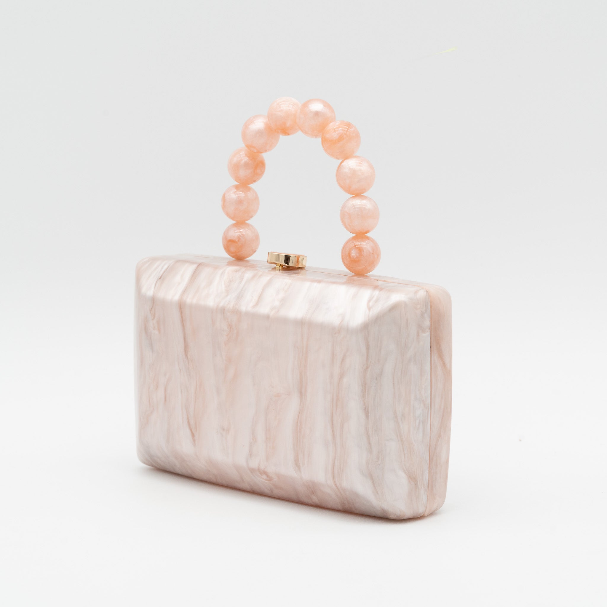 Bolso de fiesta con acabado efecto nácar y asa de esferas decorativas nude