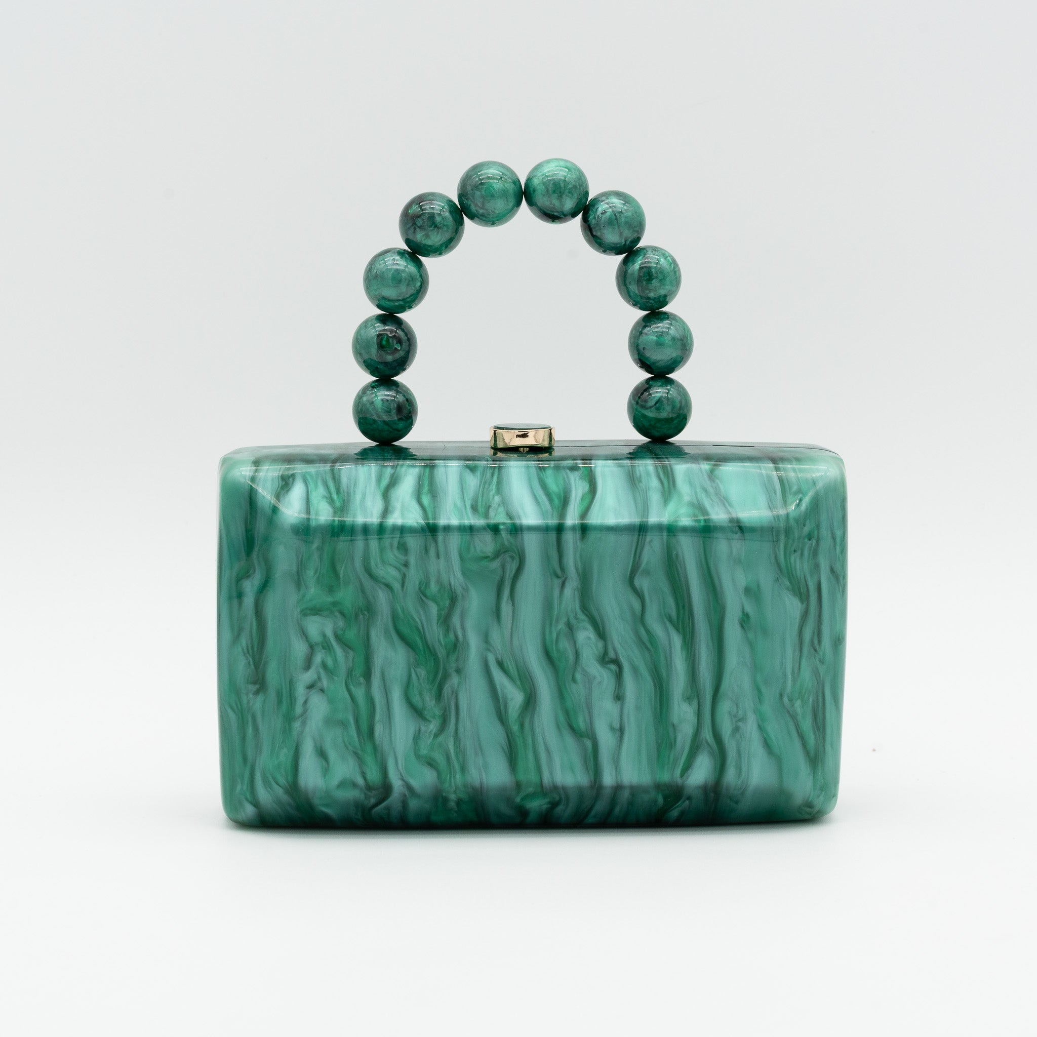 Bolso de fiesta con acabado efecto nácar y asa de esferas decorativas. Color verde