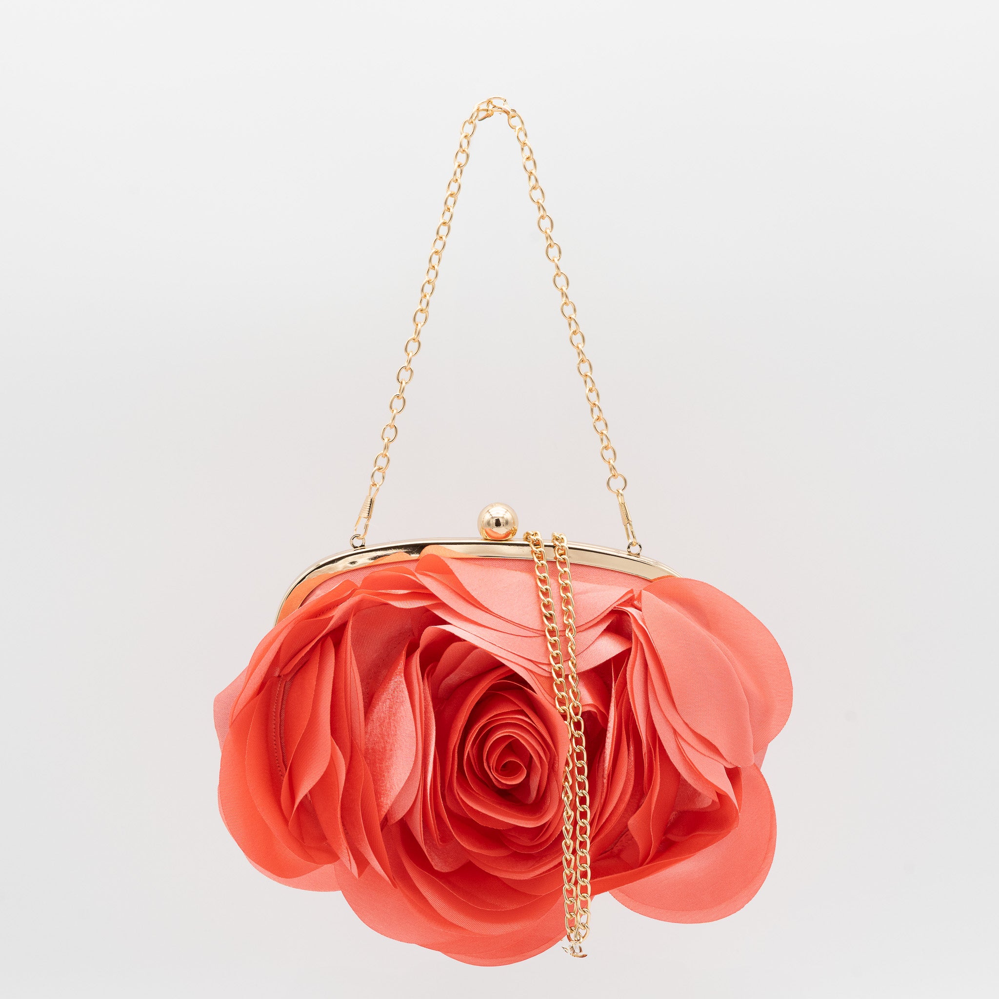 Bolso de fiesta con diseño floral en raso coral y cadena dorada