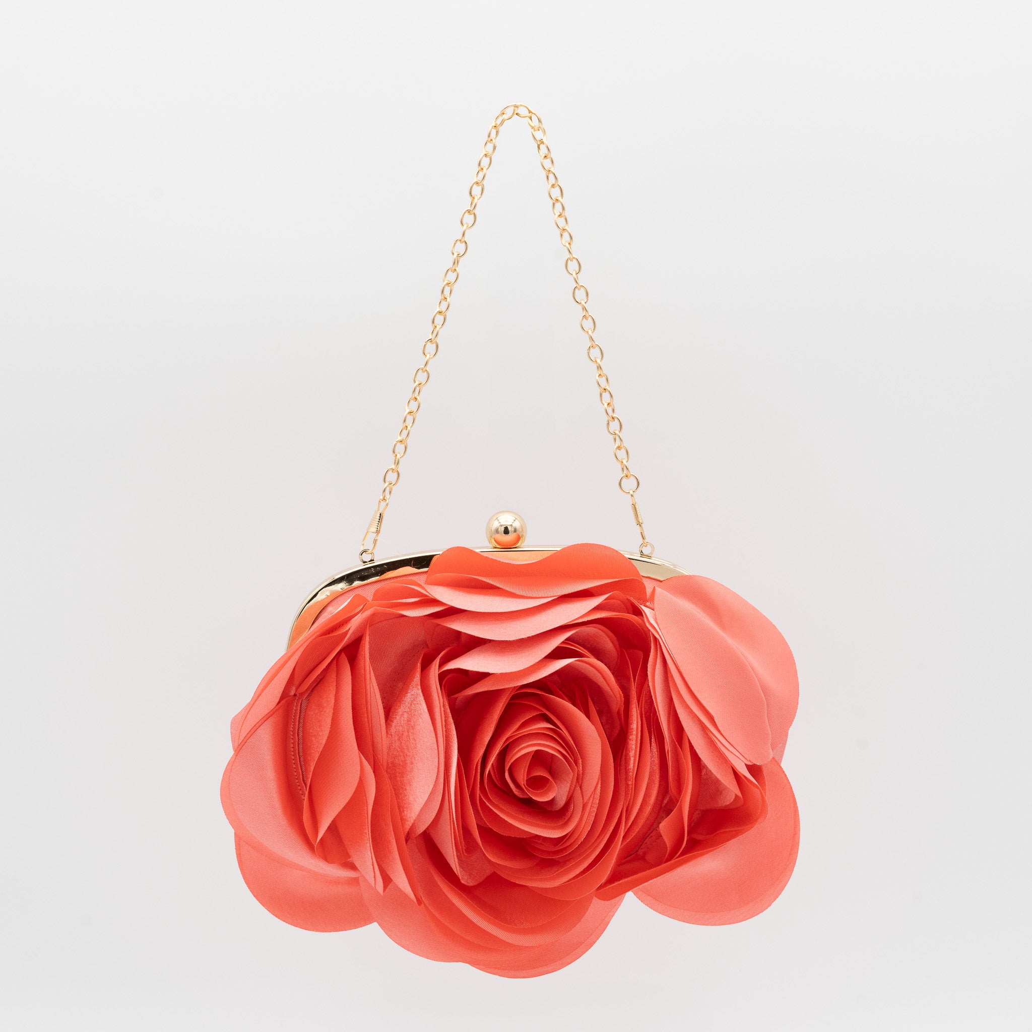 Bolso de fiesta con diseño floral en raso coral y cadena dorada