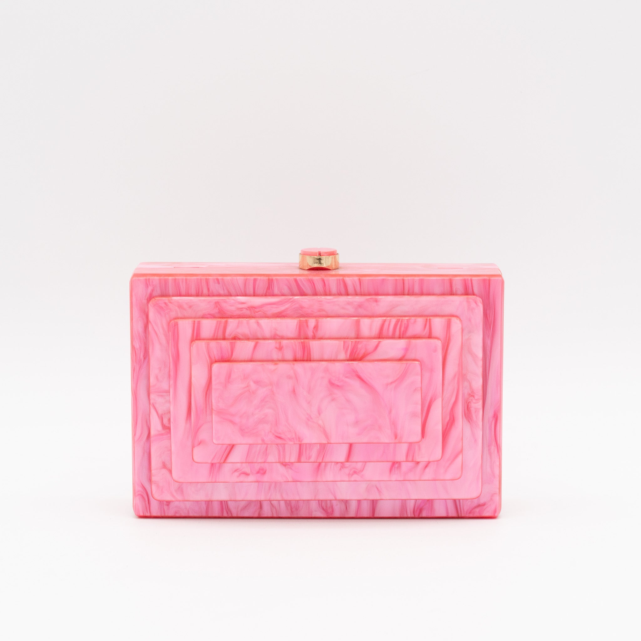 Bolso de fiesta efecto nácar fresa con diseño rectangular en relieve. Incluye cadena desmontable