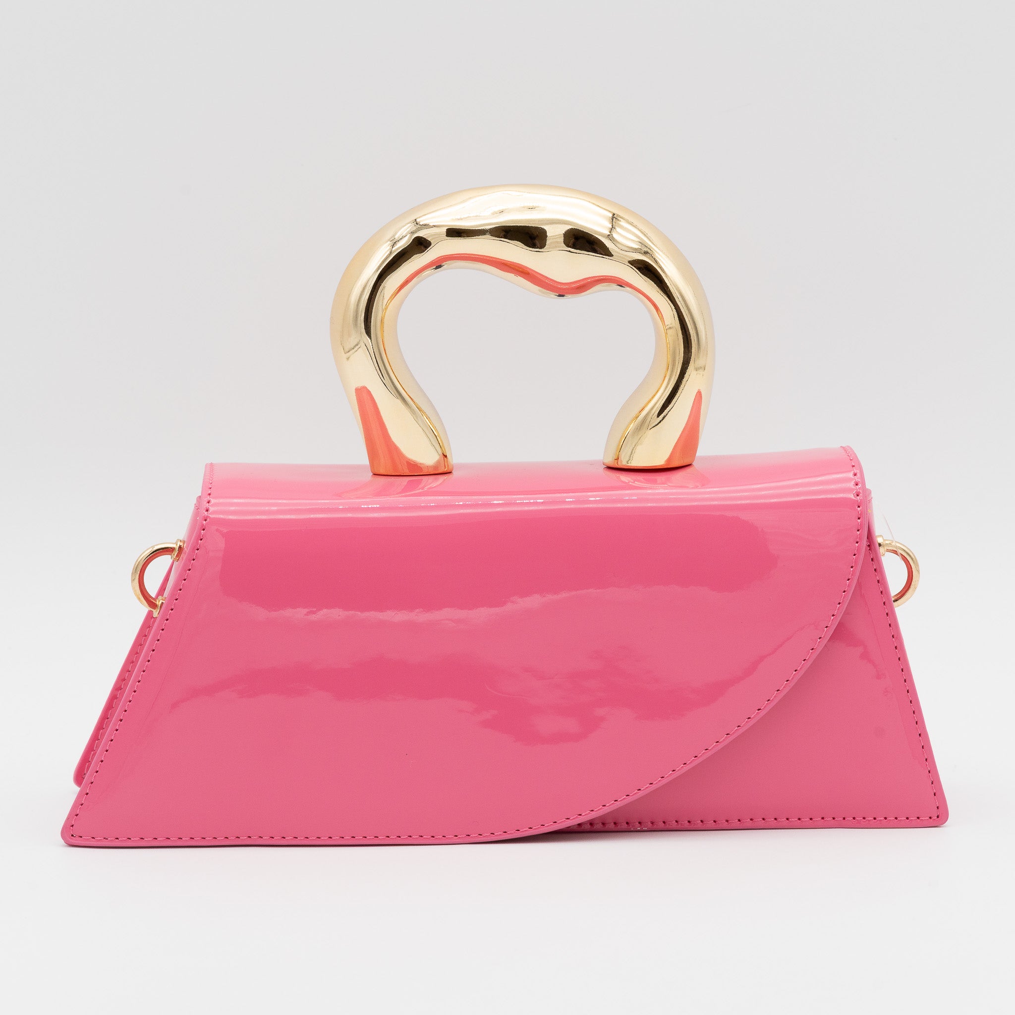 Bolso de fiesta de polipiel con efecto acharolado fucsia, asa de mano con acabado metálico y cierre imantado