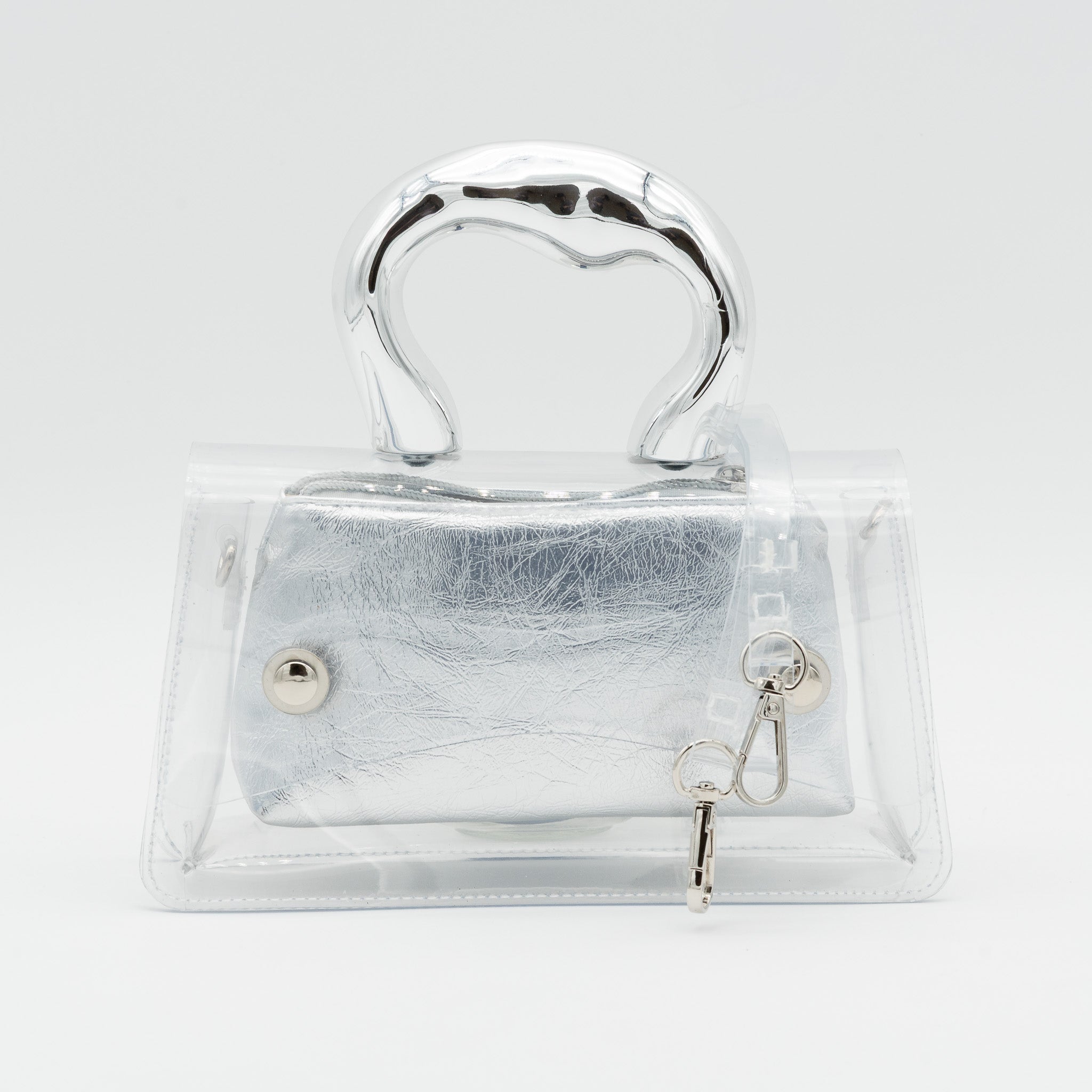 Bolso de fiesta transparente con asa efecto metálico e interior de polipiel plata con cremallera