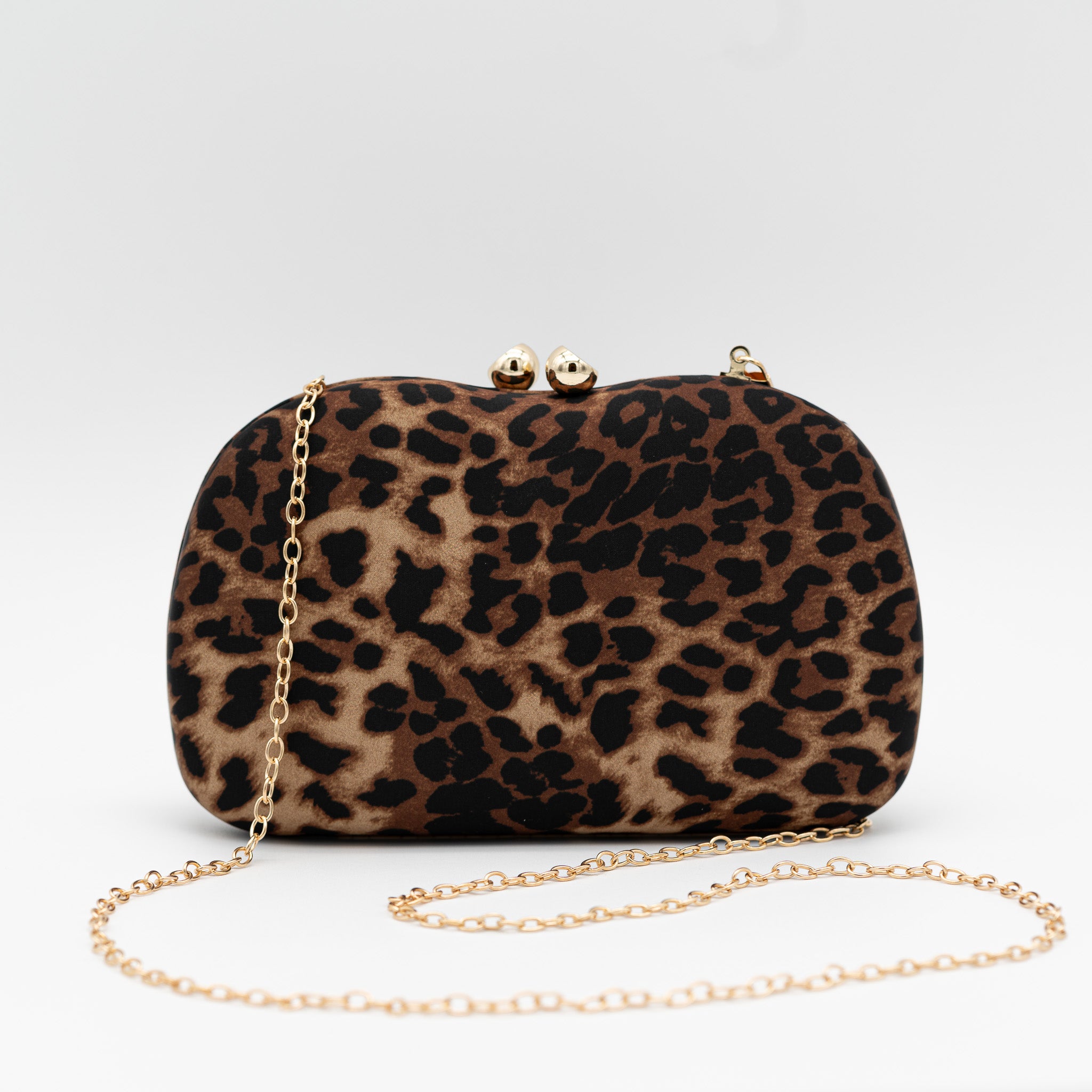 Bolso clutch de fiesta con estampado de leopardo, cierre dorado de bolitas y cadena extraible