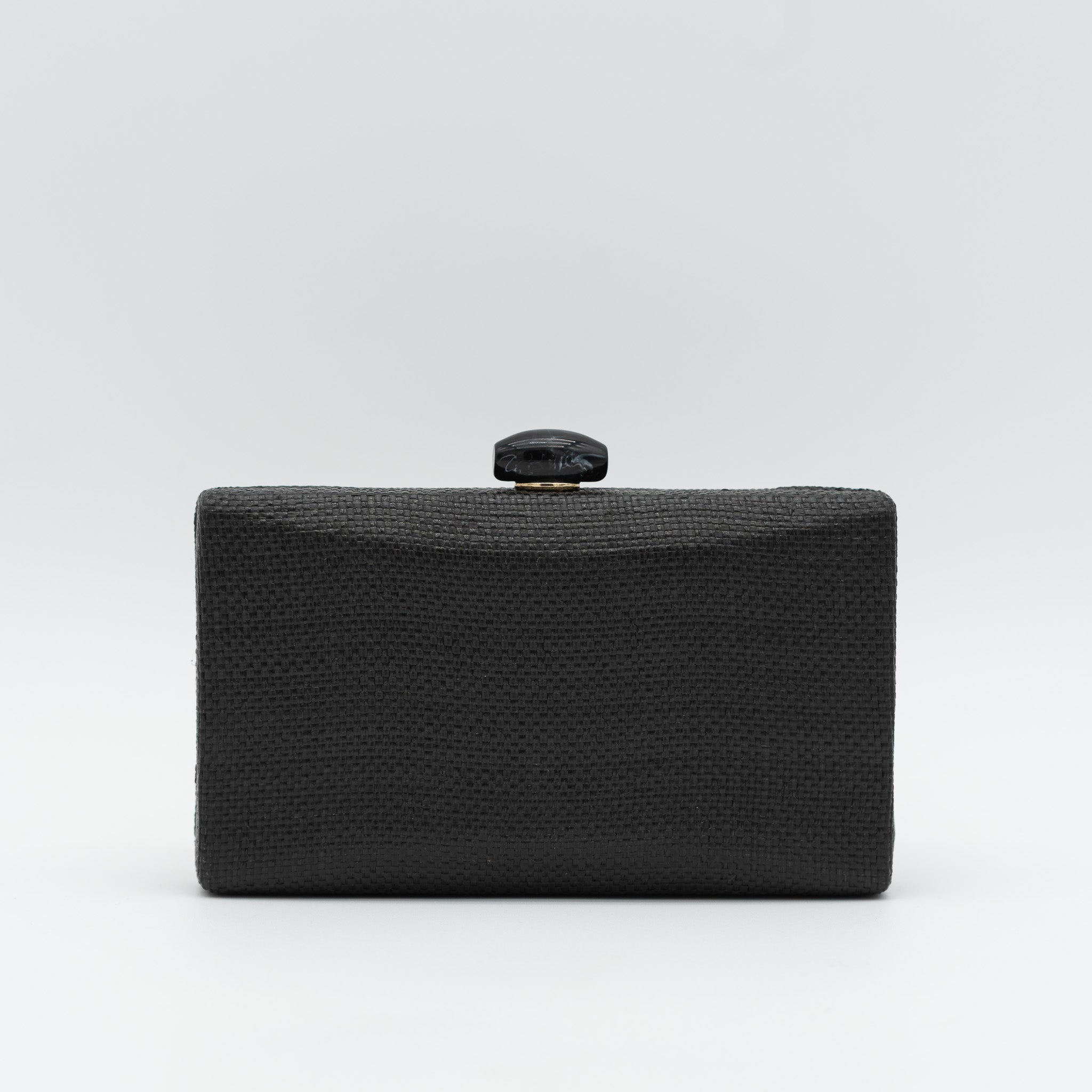 Clutch de fiesta en rafia negro con cierre con abalorio y cadena desmontable, ideal para bodas y cócteles